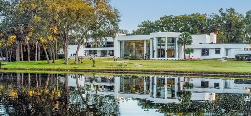 The Alexander Estate — modern lakefront residence on more than 11 private acres in Sweetwater Club, Longwood, Florida